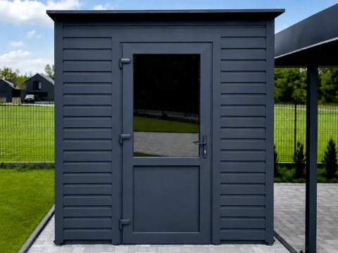 Małe stalowe pomieszczenie gospodarcze z drzwiami wejściowymi